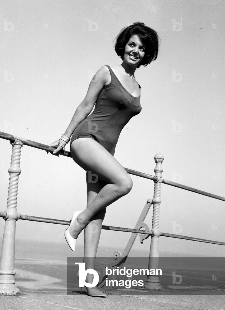 Miss UK finalist 1964, Luisa Debaisa Gibbins, pictured on Blackpool's Golden Mile. 2nd September 1964 (b/w photo)
