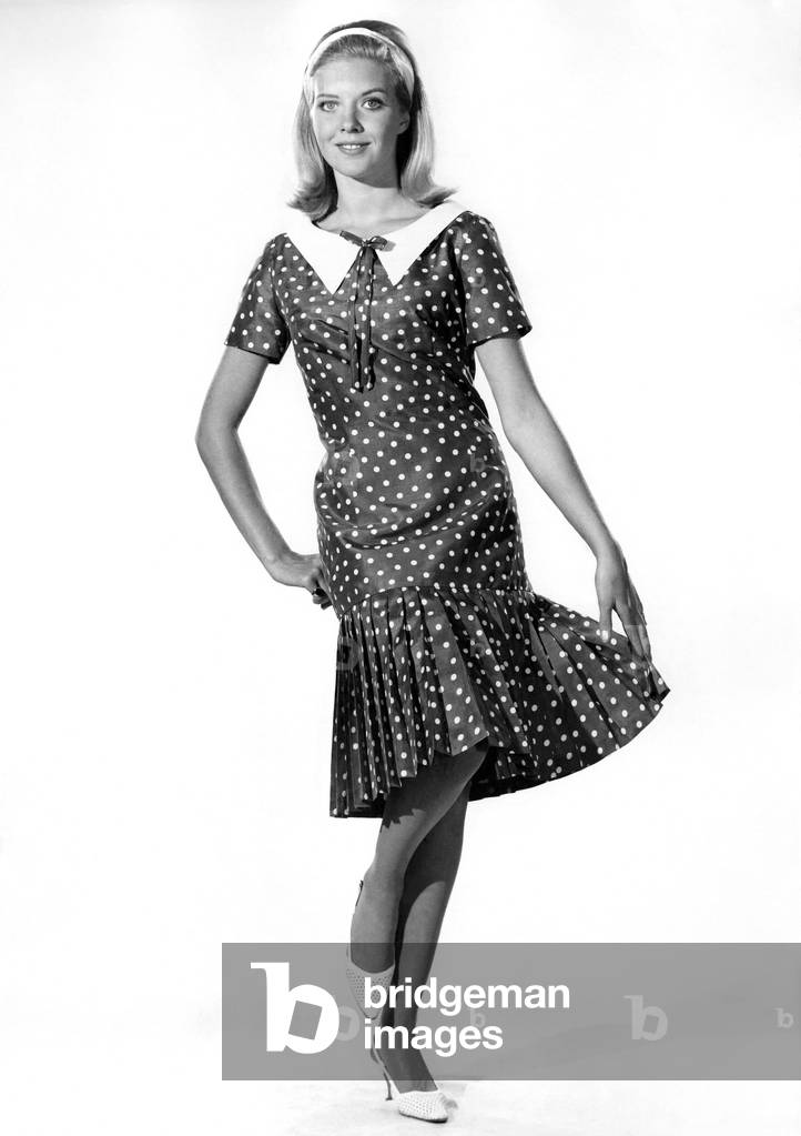 Reveille Fashions 1965: Maureen Walker wearing collared dress , April 1965
