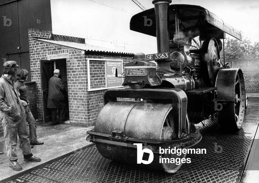 Traction engine steam roller Highland Lass at the public weighbridge belonging to the West Cumberland Farmers Trading Society on 2nd June 1972 (b/w photo)
