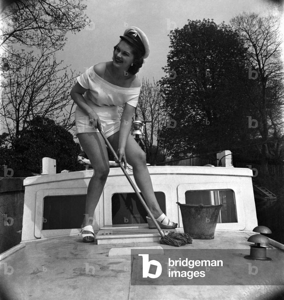 Actress Lisa Daniely seen here on her cabin cruiser at Shepperton film studios.