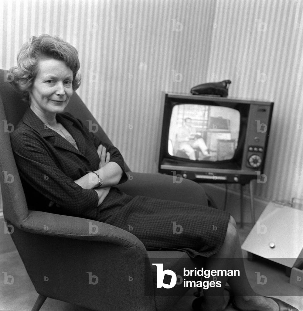 Mrs Jane Attenborough at home after hearing the announcement of her husband David's appointment as controller of BBC2 Daily Herald, 4th March 1965 (b/w photo)