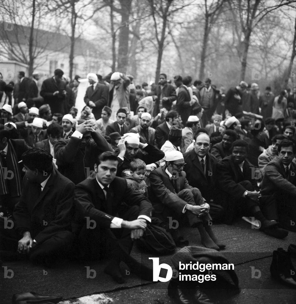 On a murky foggy December day between five to seven thousand Muslims of many nationalities assembled at a Islamic Cultural Centre in Regents Park to celebrate the Id-Ul-Fitr. Many marquees were put up for people to play in while the overspill knelt outside on prayer carpets, blankets and newspapers. December 1969