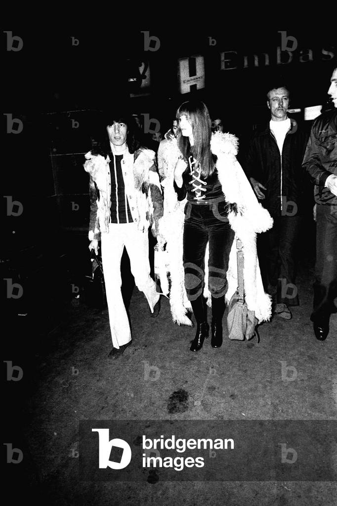Rolling Stones: Bill Wyman & his girlfriend Astrid arrive at Newcastle Central Station, 1971