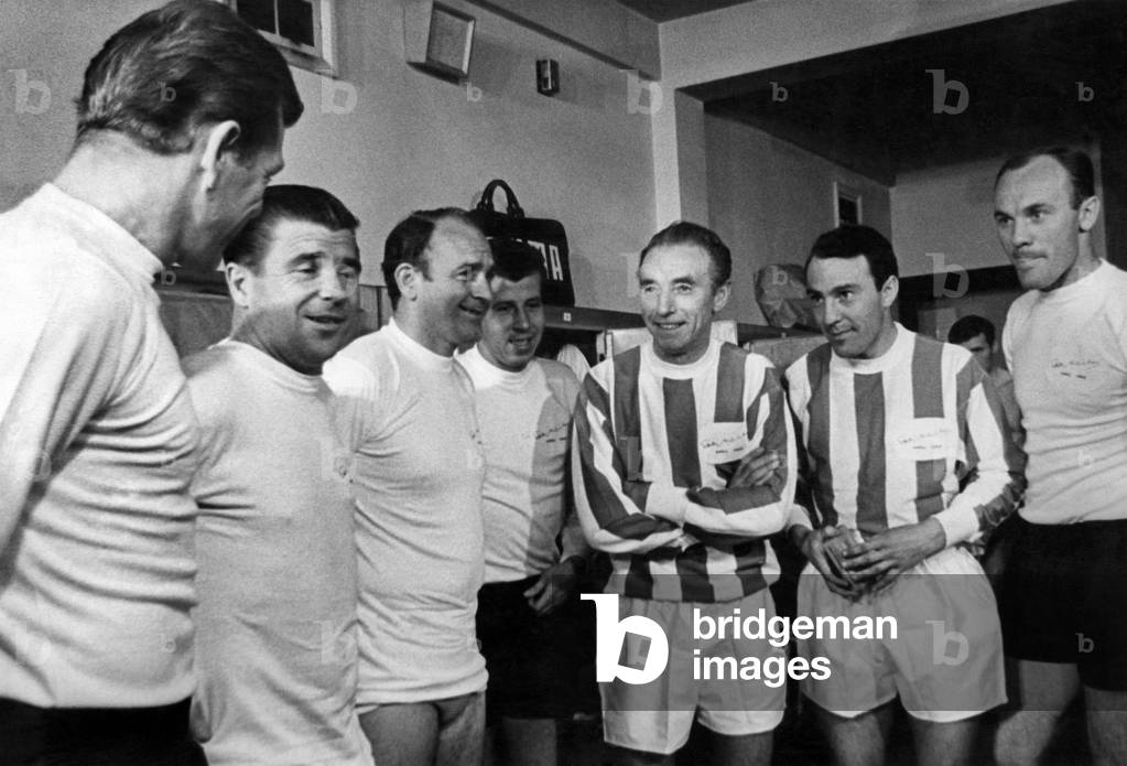 Sir Stanley in the dressing room with his international friends around him. April 1965 (photo)