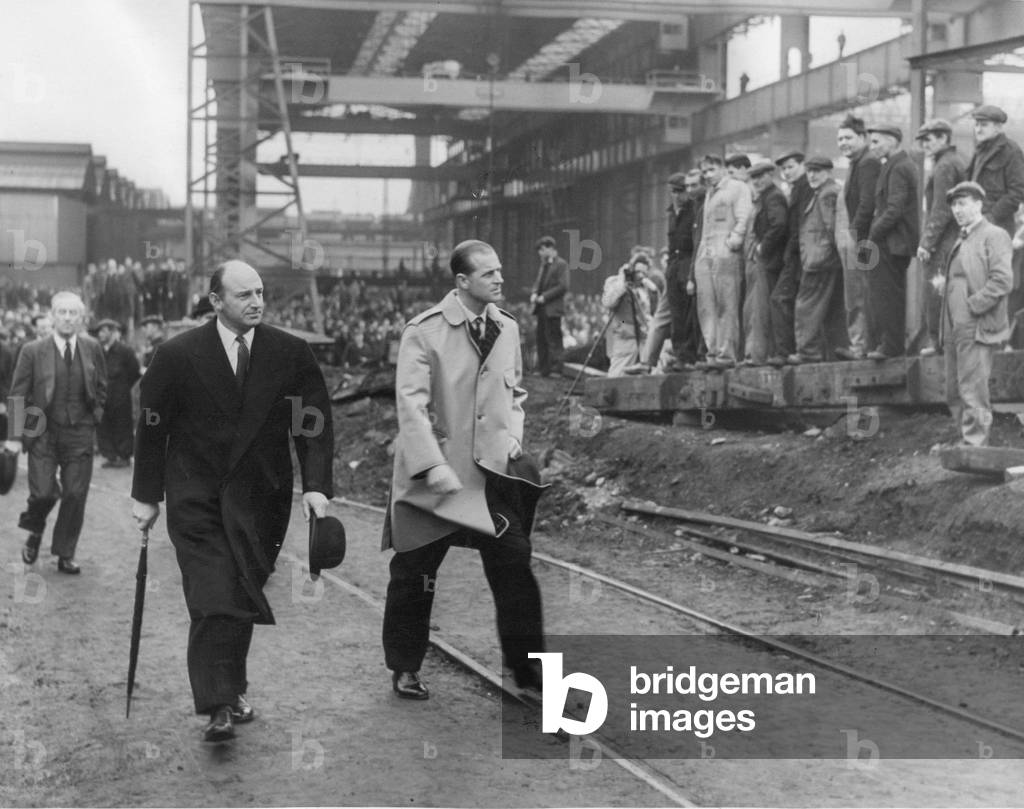 Prince Philip, Duke of Edinburgh, during a visit to Swan Hunter and Wigham Richardon Limited shipyards in Wallsend, accompanied by Mr E J Hunter, chairman, 
20/12/1957