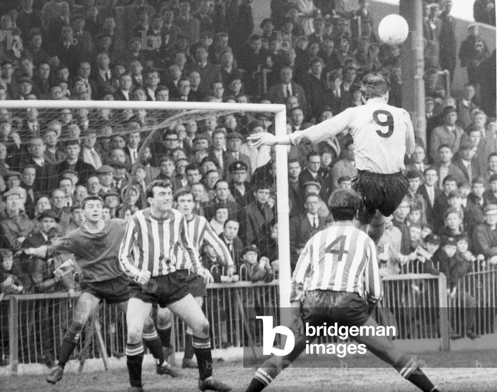 Hull City v Brentford Chris Chilton, Hull's centre forward soars above the Brentford defence. The final score was a four two victory to Hull. April 1966W3535 17a (photo)