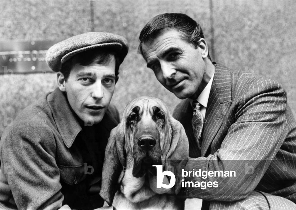 Laurence Payne who plays Sexton Blake & Roger Foss who plays Tinker with Saintly the bloodhound who plays Pedro in Rediffusions new television serial, September 1967 (b/w photo)