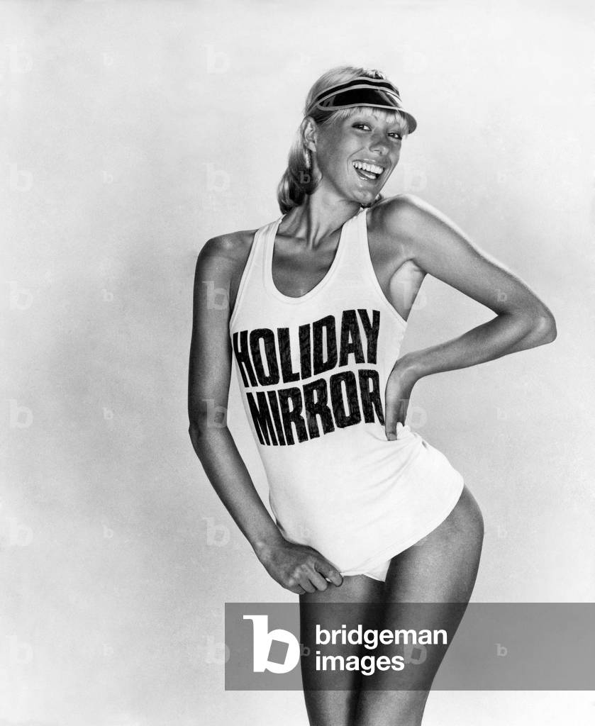 Clothing Beach. Model wears a t-shirt saying 
