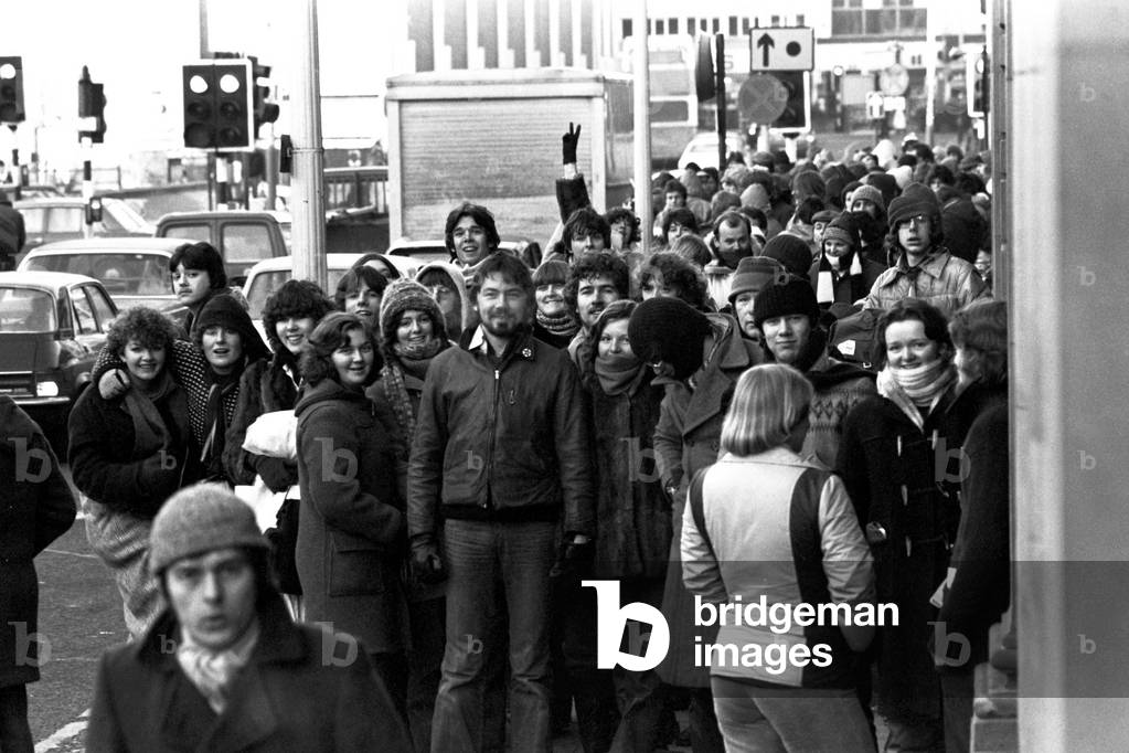 Elton John fans spent the night in sub-zero temperatures to make sure of getting tickets for the superstars concerts at Newcastle City Hall. 40 campers had taken their places on the steps in advances of Elton's March 22nd and 23rd gigs. 2nd February, 1979 (b/w photo)