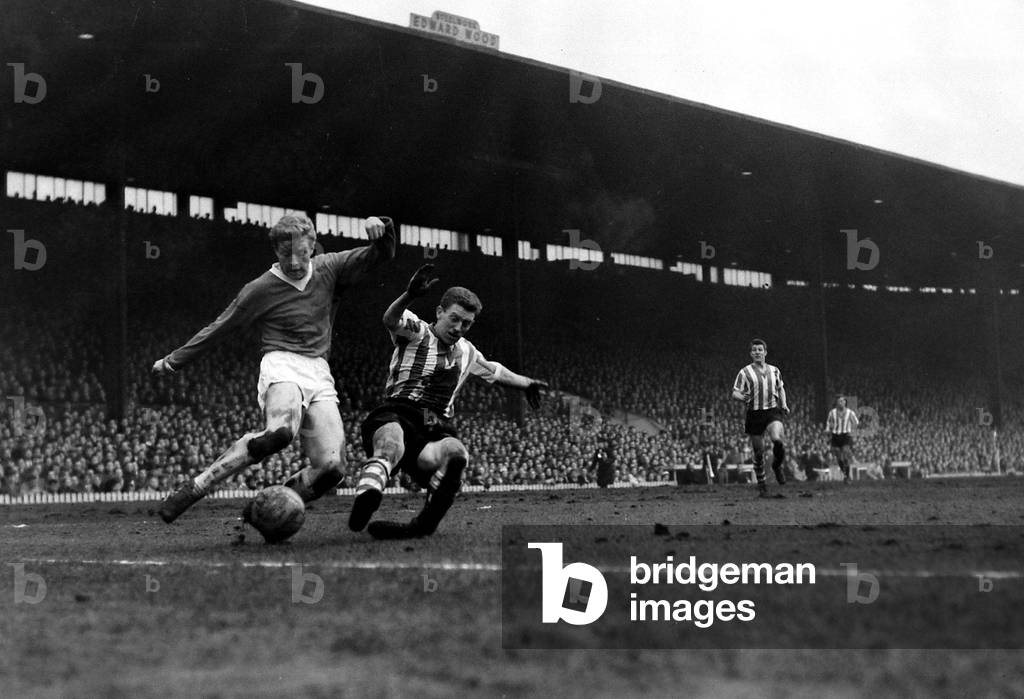Action during the league match between Manchester United and Sheffield Wednesday at Old Trafford February 1960 (photo)