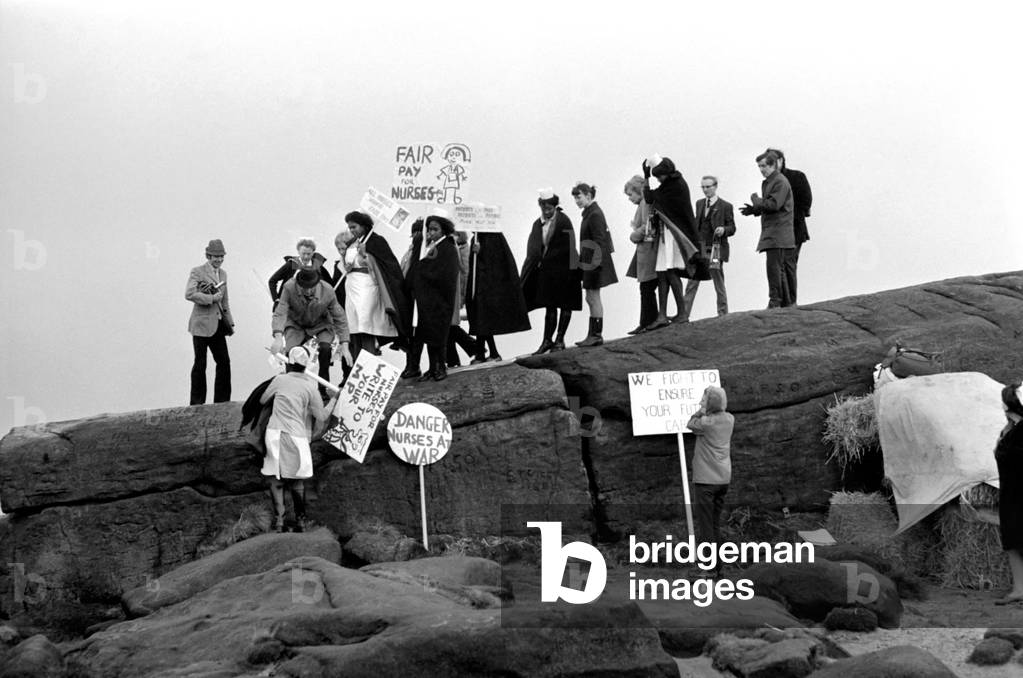 Nurses campaigned for more pay near Ilkley when they marched from the town centre to the Cow & Calf Rocks high on the Ilkley moors where they intend to camp. Pictures show the nurses on their way to the Cow and Calf Rocks
December 1969