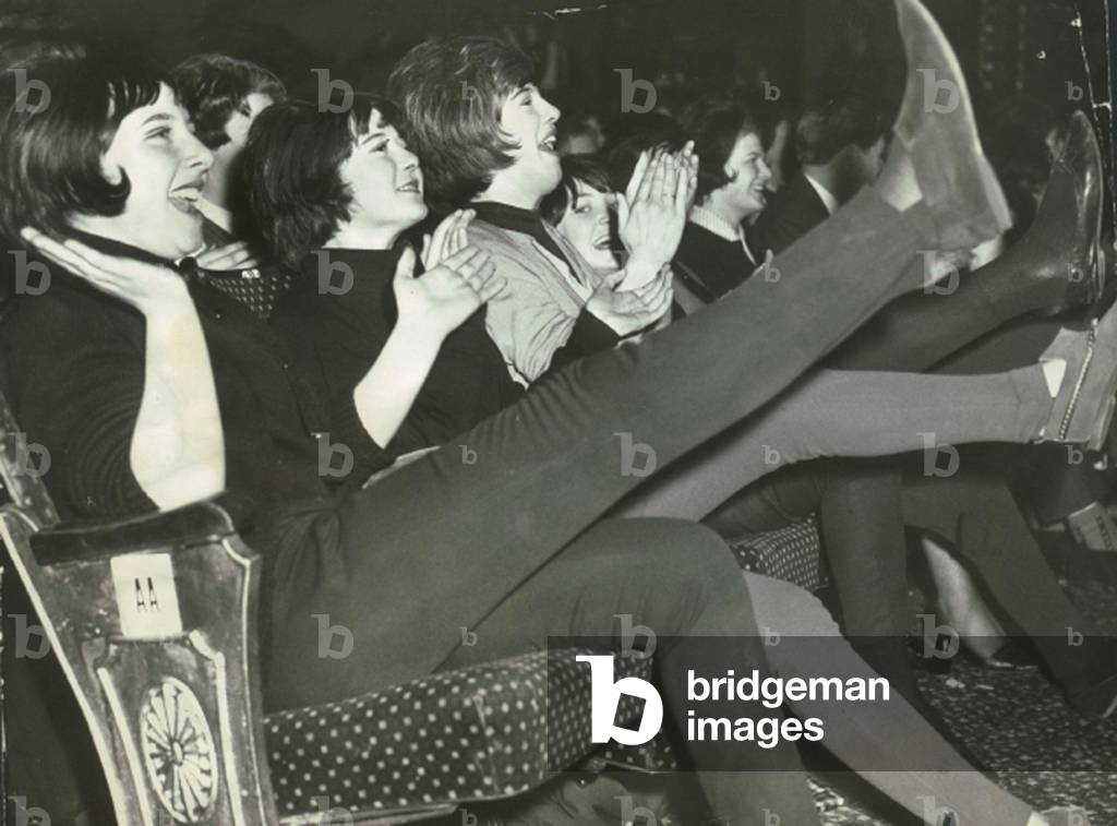Beatles at the Globe Theatre, Stockton show the fans clapping and screaming. 22nd November 1963 (b/w photo)