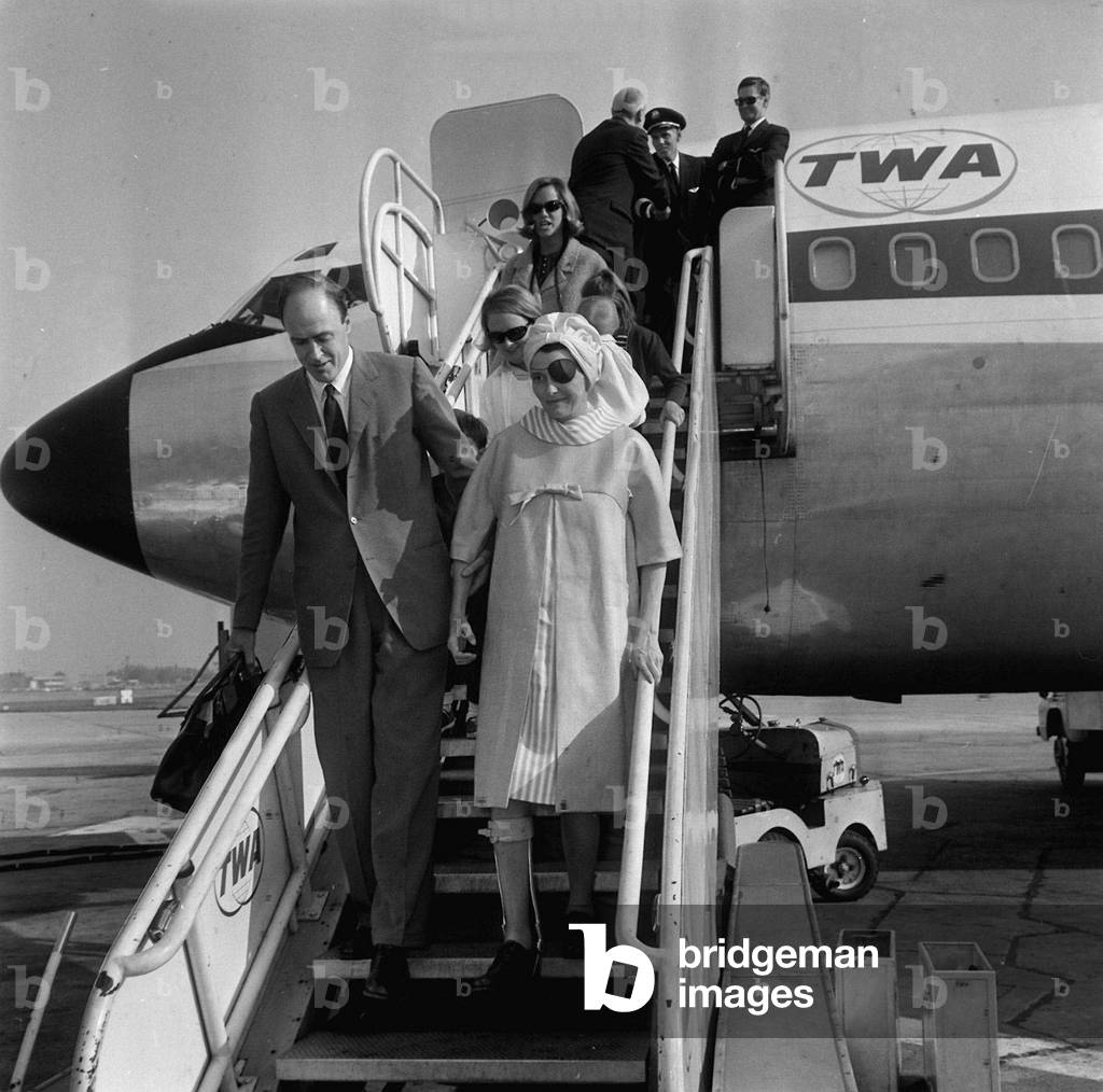Actress Patricia Neal arriving at London Airport, 20th May 1965 (b/w photo)