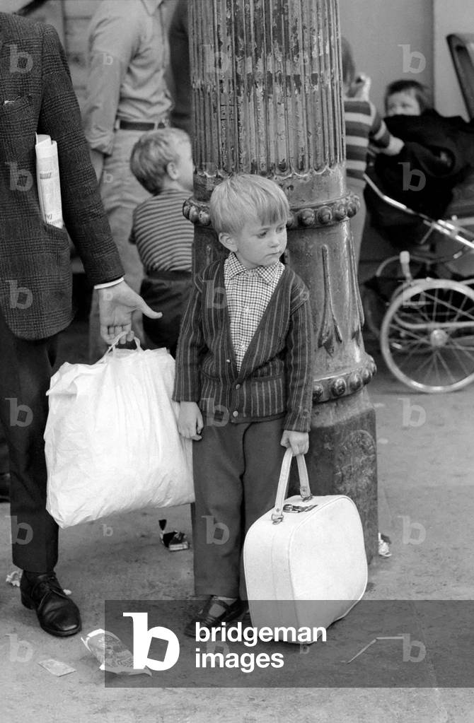 George Phillips, staff. Northern Ireland July 1972. Children waiting for the train in Belfast as families flee from the bombs and bullets. July 1972. July 1972 72-7262-003