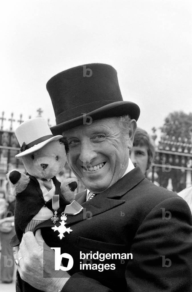 Harry Corbett and Sooty at investiture at Buckingham Palace, Jult 1976 (b/w photo)