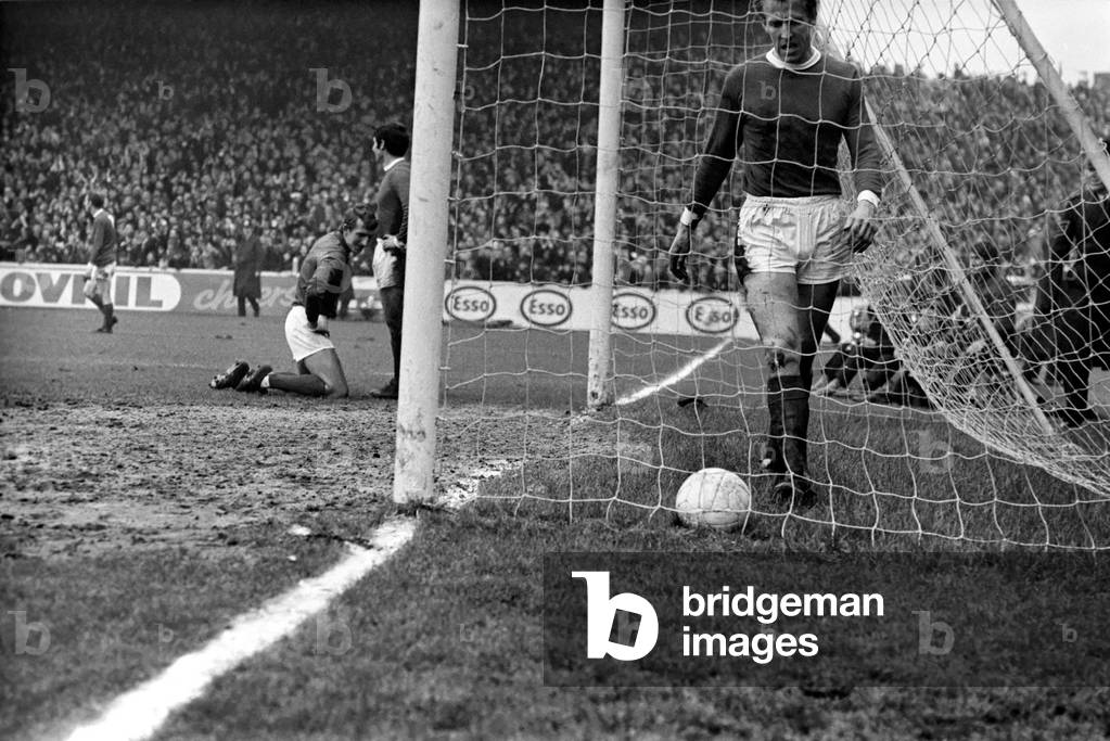 Manchester City 4 v. Manchester United 0. City's 1st goal. With Stepney Featen and Ian Ure picking ball out of net. November 1969 (photo)