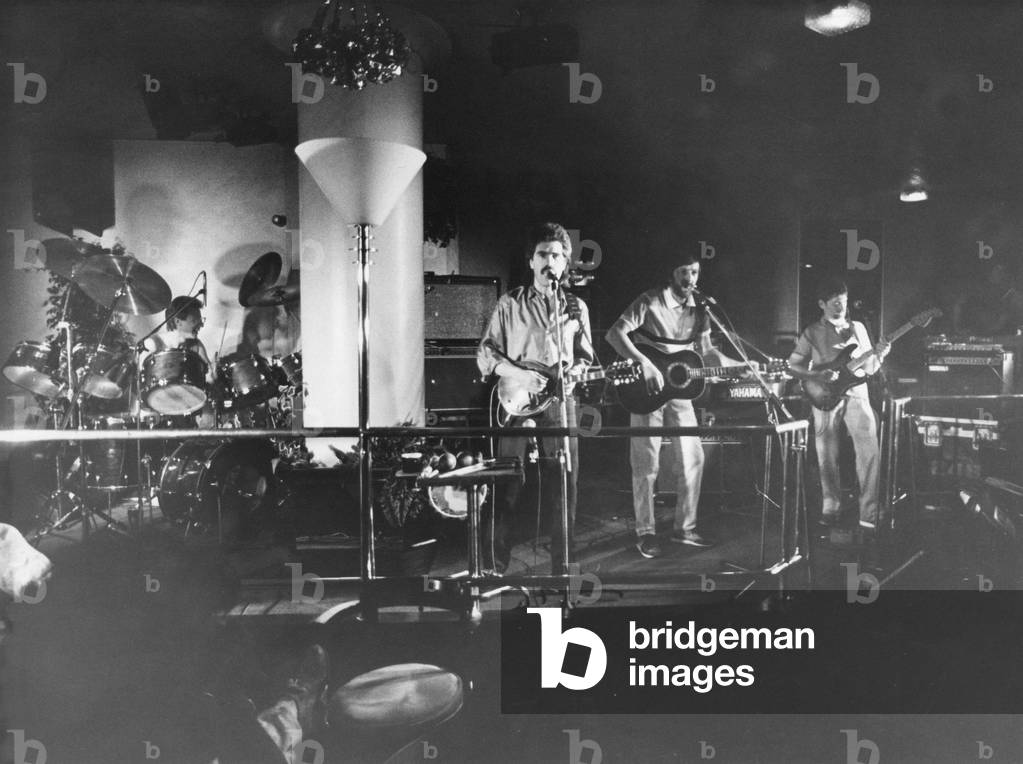 Lindisfarne in concert at Walkers Club. Ray Laidlaw, Ray Jackson, Alan Hull and Si Cowe. (Circa 1983)