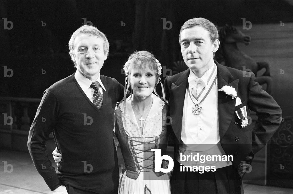 The Sound of Music' is now appearing at the Apollo Theatre in London. Pictured is Petula Clark as Maria and Michael Jayston as Captain Von Trapp with producer Ross Taylor. 4th August 1981 (b/w photo)