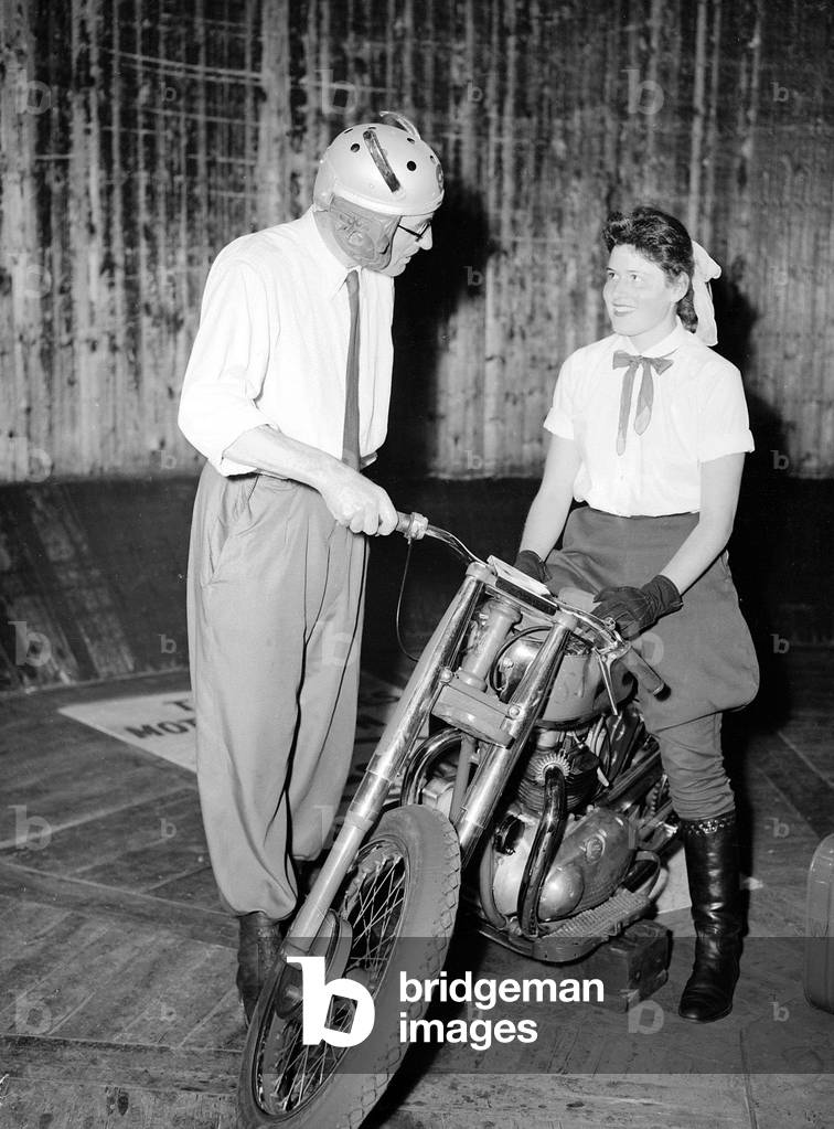 Juliett Mitchel Wall of Death stunt motorcycle rider Motorcycle Stunts Show, c. 1950s (b/w photo)