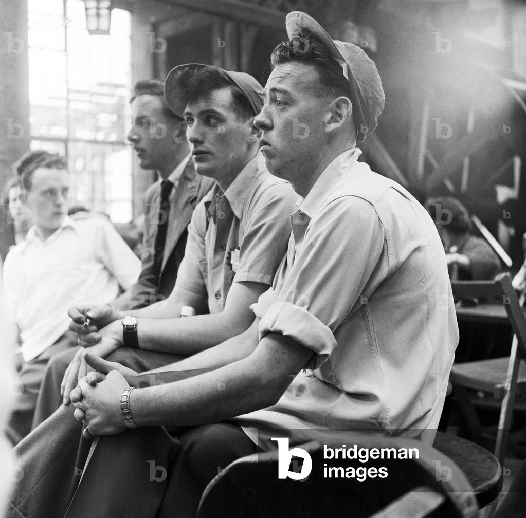 Bored boys watching a concert at Butlins Holiday Camp, Filey, North Yorkshire. 30th July 1954.