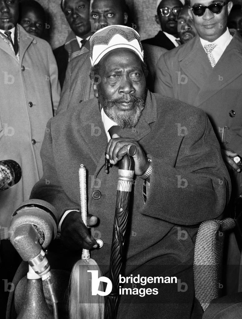 Jomo Kenyatta, leader of the Kenya African National Union, pictured on his arrival at London airport for the Kenya Constitutional Conference.
11th February 1962.