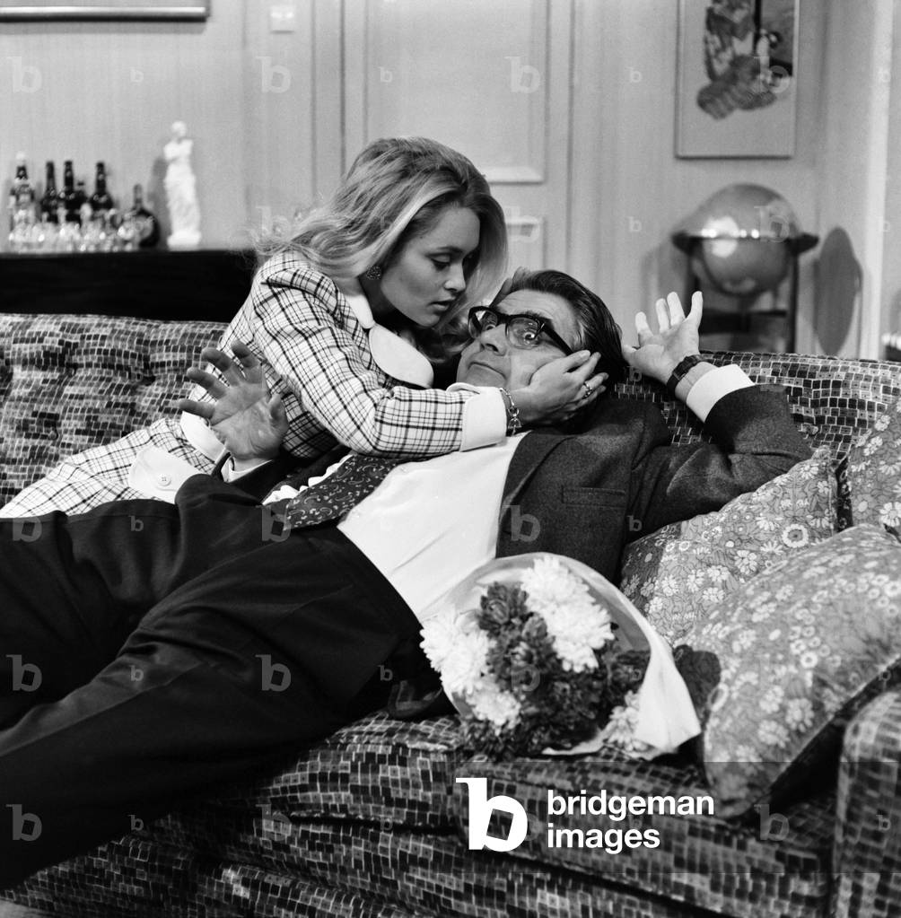 Entertainment television programmes: Harry Worth, bumbling bachelor of BBC-1's comedy series, gets his very first girlfriend in 10 years of television, in the 100th episode, recorded yesterday (Saturday, Nov. 15th). The girl is goregous Alexandra Bastedo, playing Francoise, a French girl who has been Harry's pen-friend for some time. November 1969