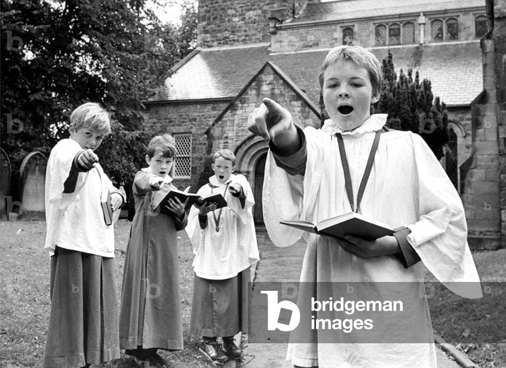 Choirboys of St. Andrew's parish Church chair, Corbridge, Nicholas Fearon (front), and (left to right) Edward Milner, Nolan Robson and Simon Milne call for volunteers on September 9, 1985 (b/w photo)