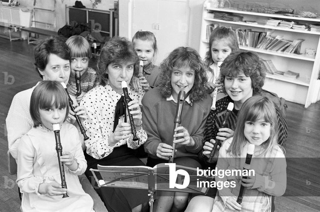 These Mirfield mothers have gone back to basics at Upper Hopton First School. They have joined their children - aged seven to nine - for school recorder lessons. 