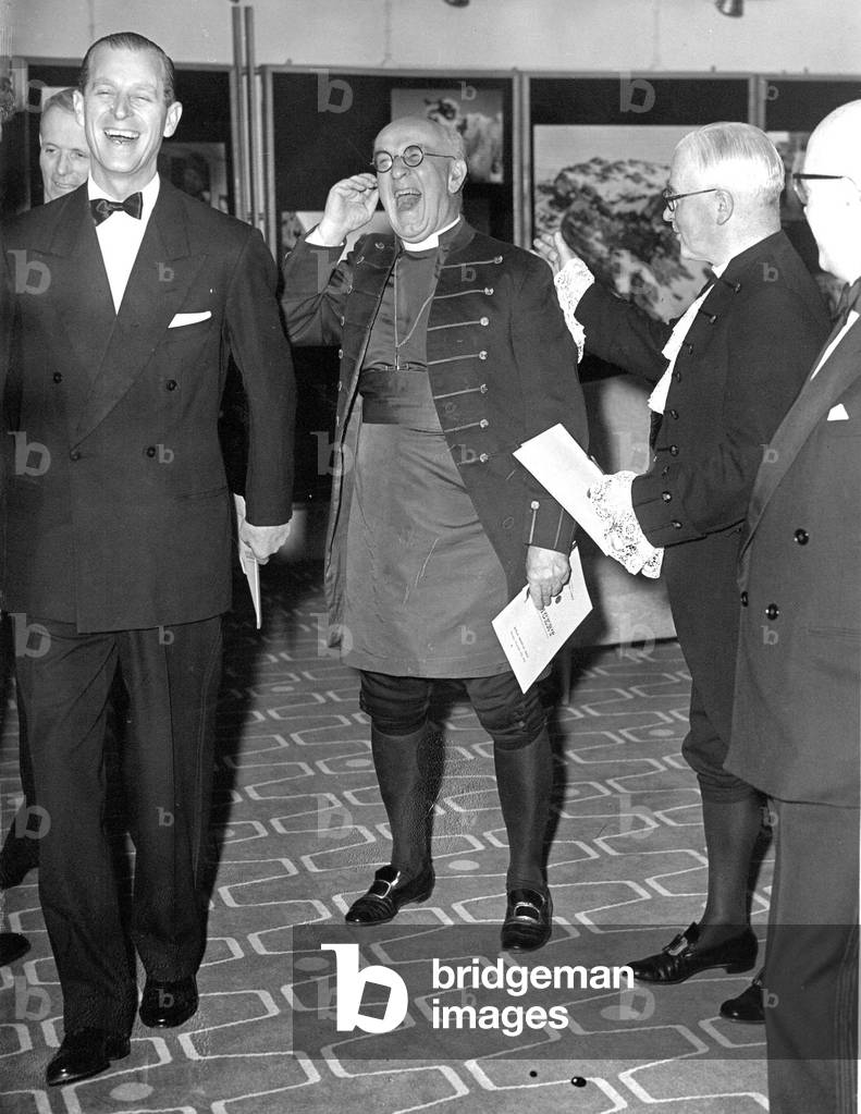 Prince Philip, Duke of Edinburgh, shares a joke with the Archbishop of Canterbury and Dr J A Fraser just before the concert in aid of the Duke's award scheme for Initiative in Youth, 1950 (b/w photo)