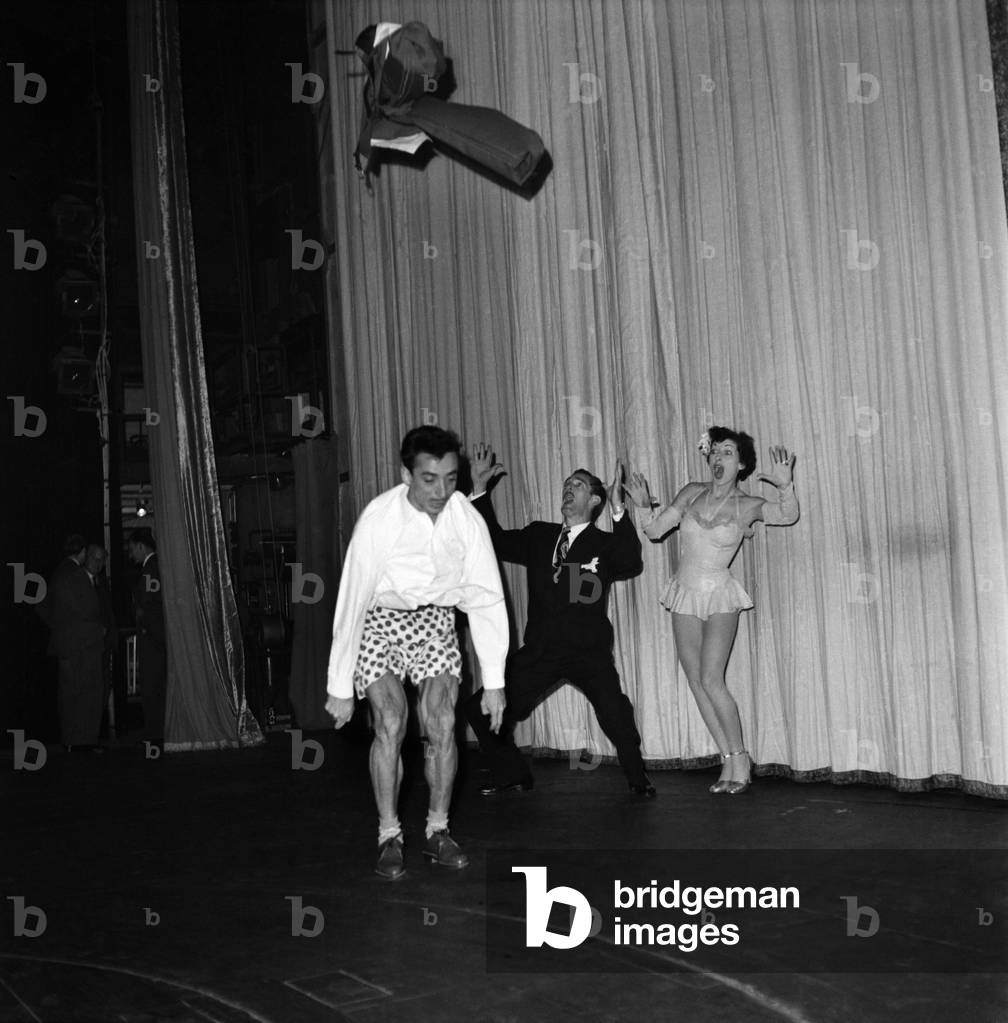 Warren, Latona, and Sparks act at the Palladium.