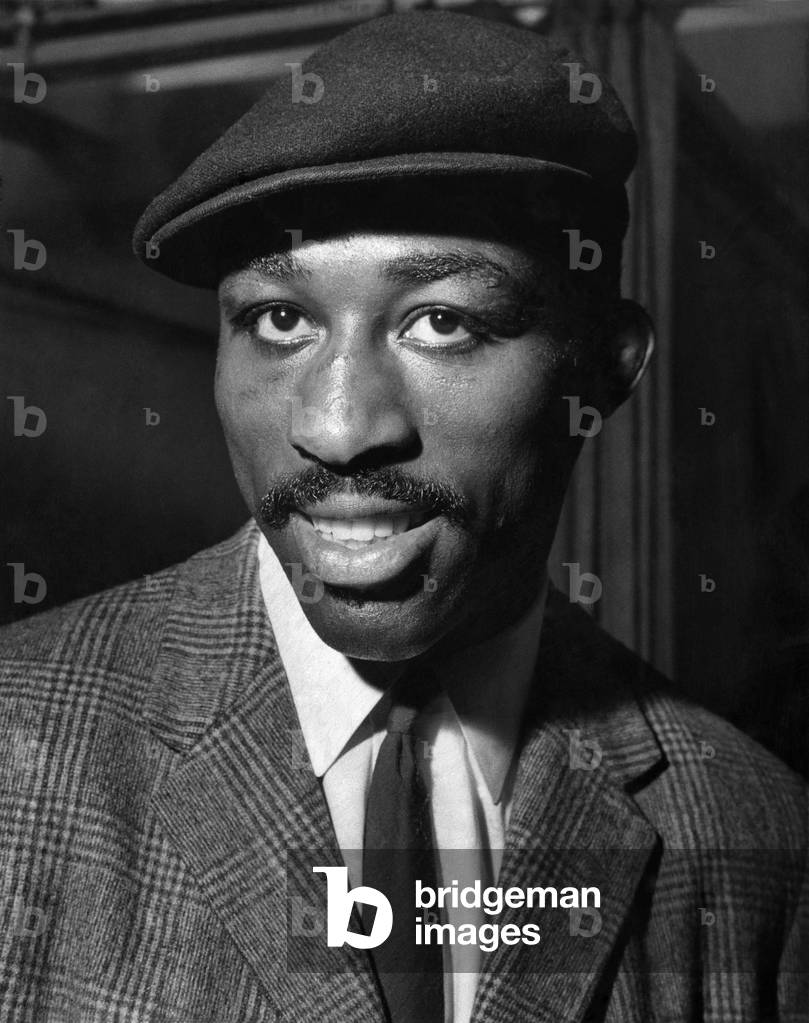 Randy Sandy sports a natty cap as he arrives for a work out for the fight, 11th May 1959 (b/w photo)