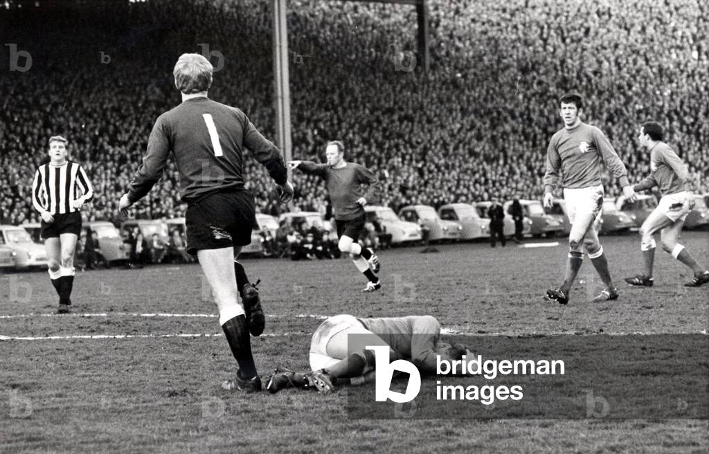 Inter City Fairs Cup Semi Final Match at Ibrox May 1969Rangers 0 v Newcastle United 0 (Newcastle win 2-0 on aggregate)Rangers goalkeeper McFaul stands over he man he brought down in the box as John Greig looks on. The referee points to the penalty spot (photo)