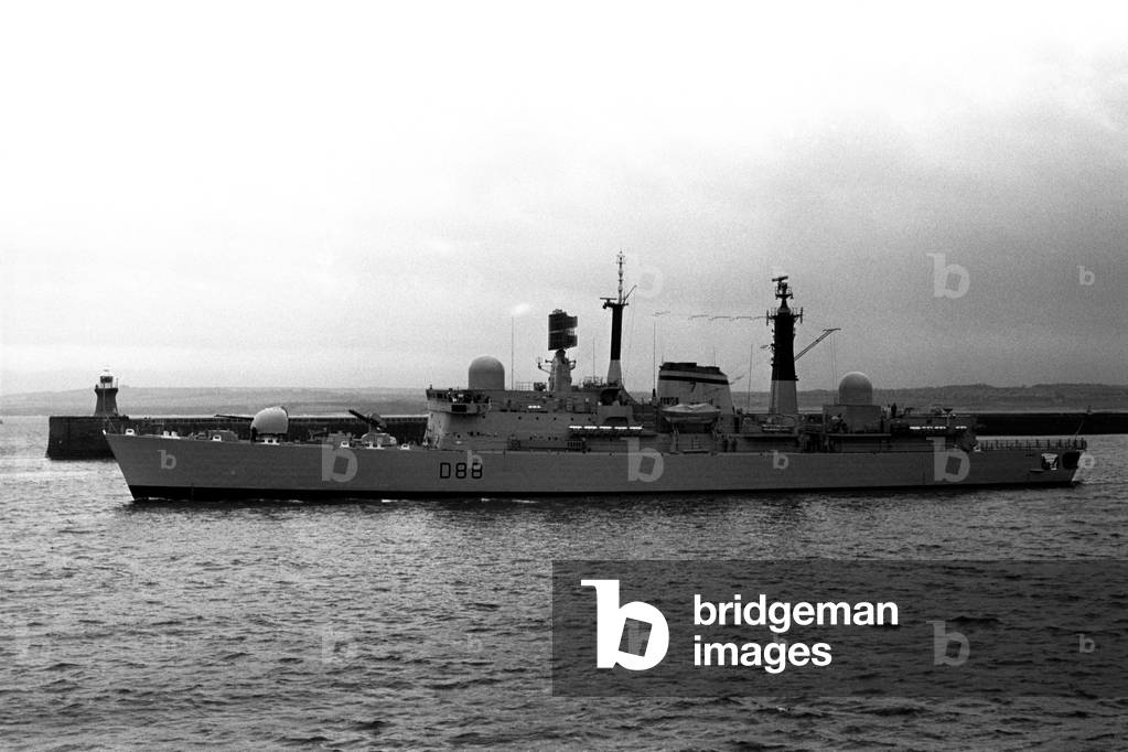 The destroyer HMS Glasgow puts to sea from the River Tyne on her way to Portsmouth to be handed over to the Royal Navy. The Swan Hunter built HMS Glasgow was the fifth Type 42 destroyer to enter service. 8th March, 1979 (b/w photo)