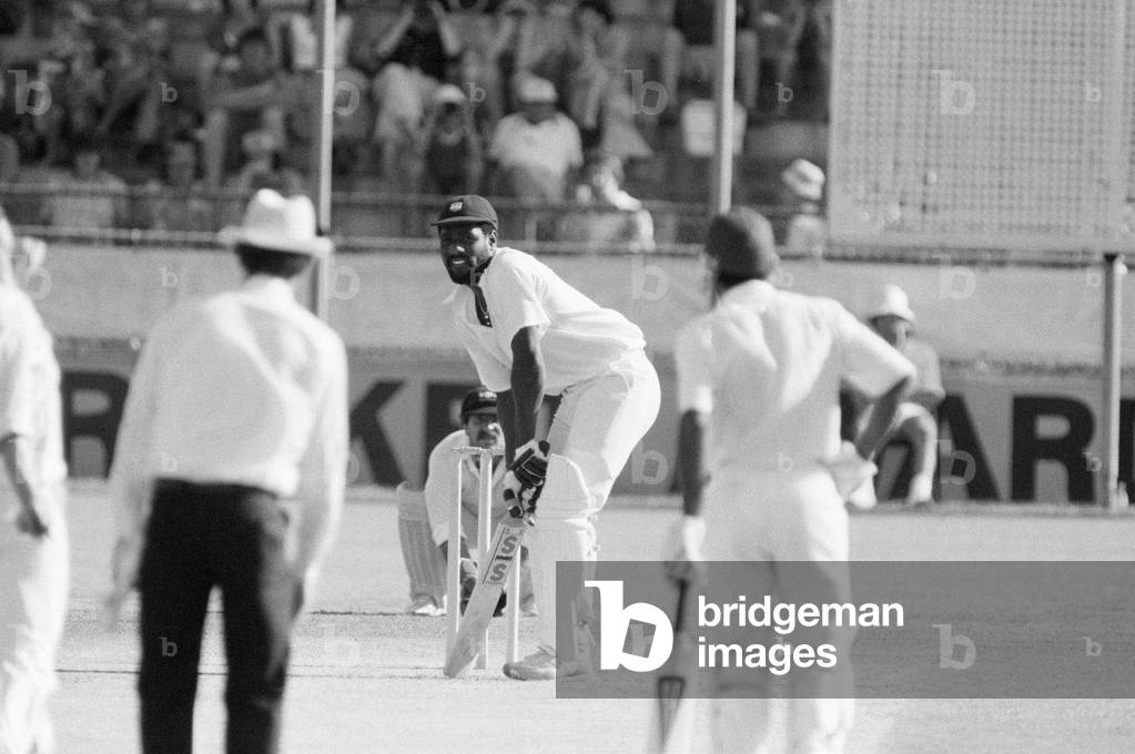 West Indies tour of Australia and New Zealand 1979 - 1980. Australia v West Indies First test match at Brisbane Cricket Ground, Woolloongabba, Brisbane. Viv Richards in batting action for West indies, waiting for a delivery at the crease. December 1979 (b/w photo)