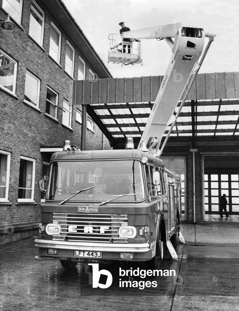 Fire fighters demonstrate the latest in fire engine equipment - Simon Snorkel the cherry picker which enables the firemen to reach high buildings, 1970