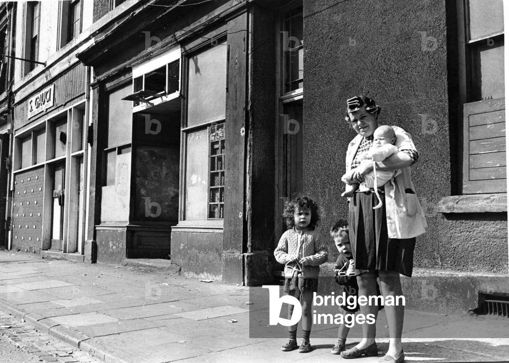 Mrs Yvonne Evans with her three children in Bute Street, Cardiff 
June 1969
