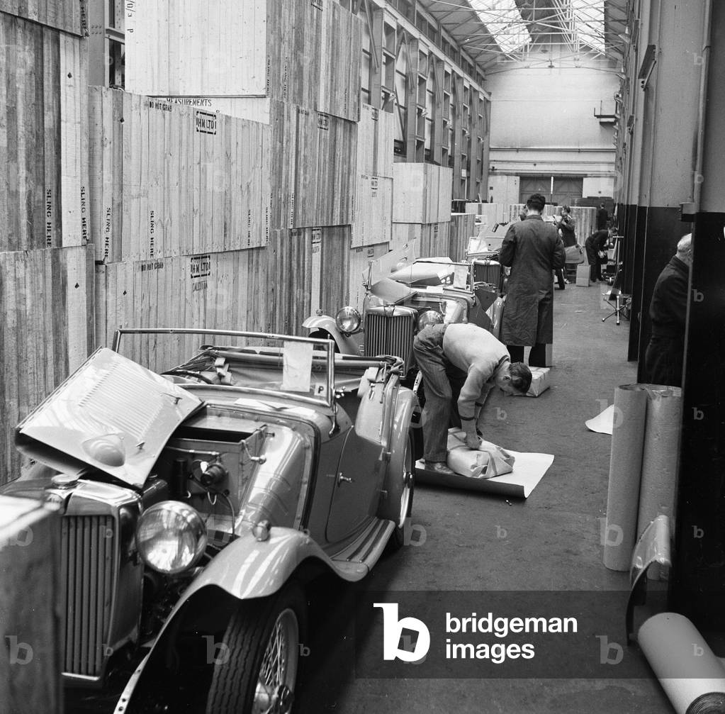 Morris MG Roadsters fresh off the production line await packing for export at Morris's Cowley factory 24th March 1949 (b/w photo)
