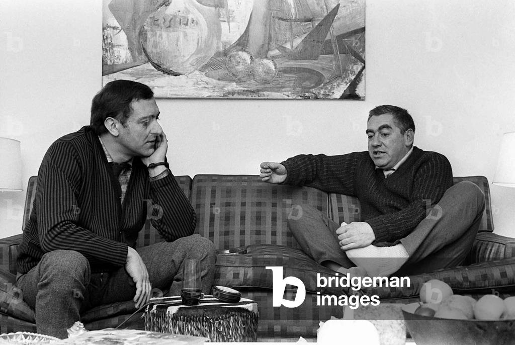 Actor Harry Corbett and Toyn Hancock sit talking in February 1963 (b/w photo)