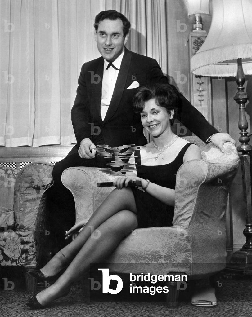 Harold Pinter winner of Scriptwriter of the Year award and his wife Vivienne Merchant who won the award as Best Actress of the year, November 1963 (b/w photo)