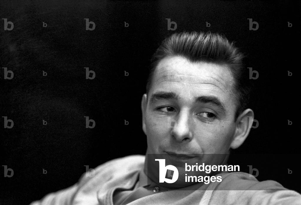 Sport: Football: Derby manager Brian Clough ponders the league cup draw the morning after his team's success at the baseball ground against Crystal Palace. Brian Clough in his office, smoking a cigarette. October 1969 (photo)