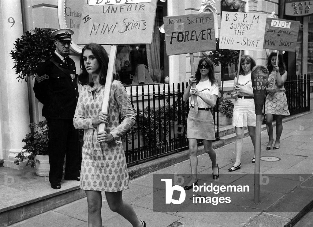 Demonstrations mini skirts outside Christian Dior