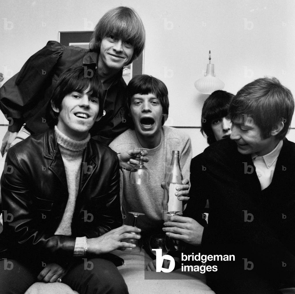 Rolling Stones celebrate in their Manchester hotel after hearing news that their latest record 