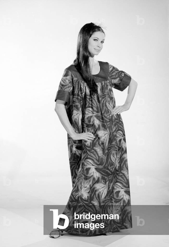 Reveille Fashion Feature Reveille Model Imogen Woodford seen here modelling a Hawaiian outfit, c. April 1964 (b/w photo)