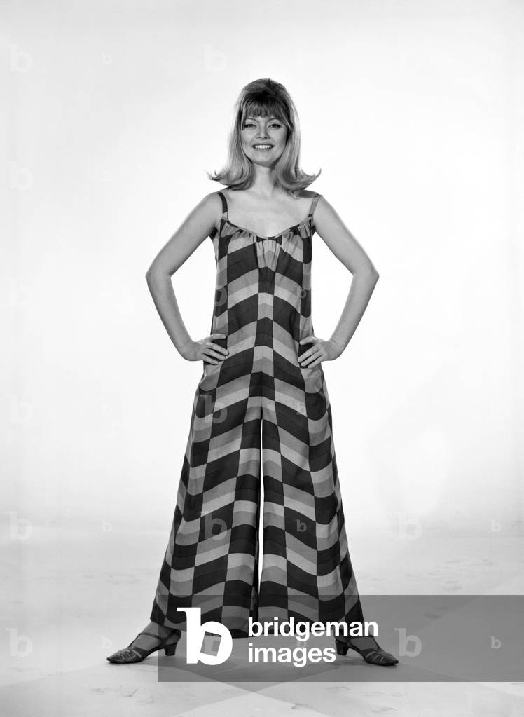 Uschie Bernell modelling beach dress/trouser in Reveille Studios 1965 (b/w photo)