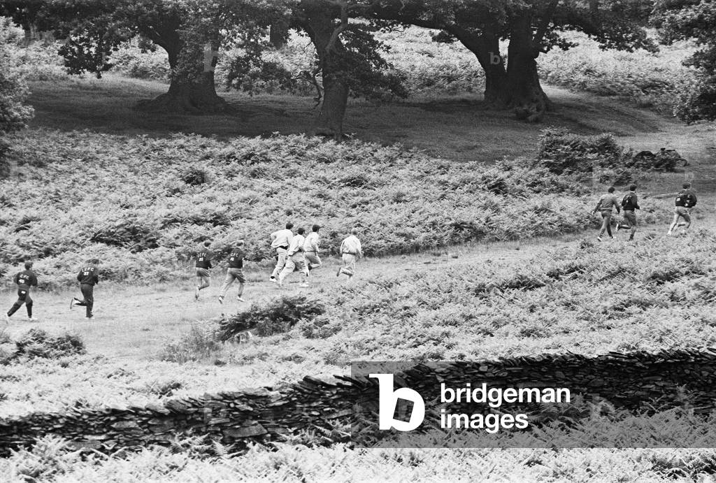 Leicester City players start their get fit programme in readiness for their fight back to the first division. The first morning training was spent in the rugged countryside of Bradgate Park, a few miles outside Leicester. 11th July 1969 (photo)