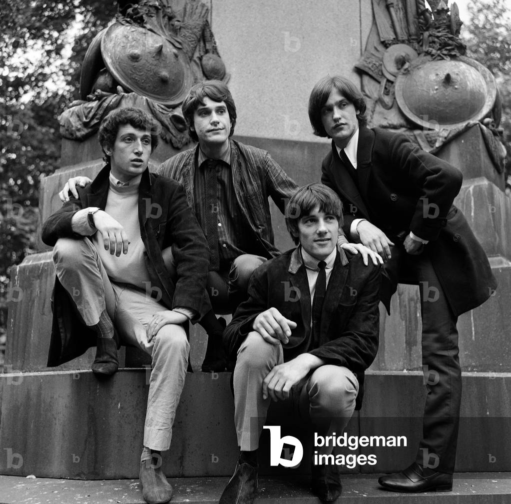 British rock group The Kinks pose on horses in the gardens opposite the Flaghouse in Charing Cross, London where they were rehearsing. Left to right: Pete Quaife, Ray Davies, Mick Avery (bottom) and Dave Davies. 7th September 1964 (b/w photo)