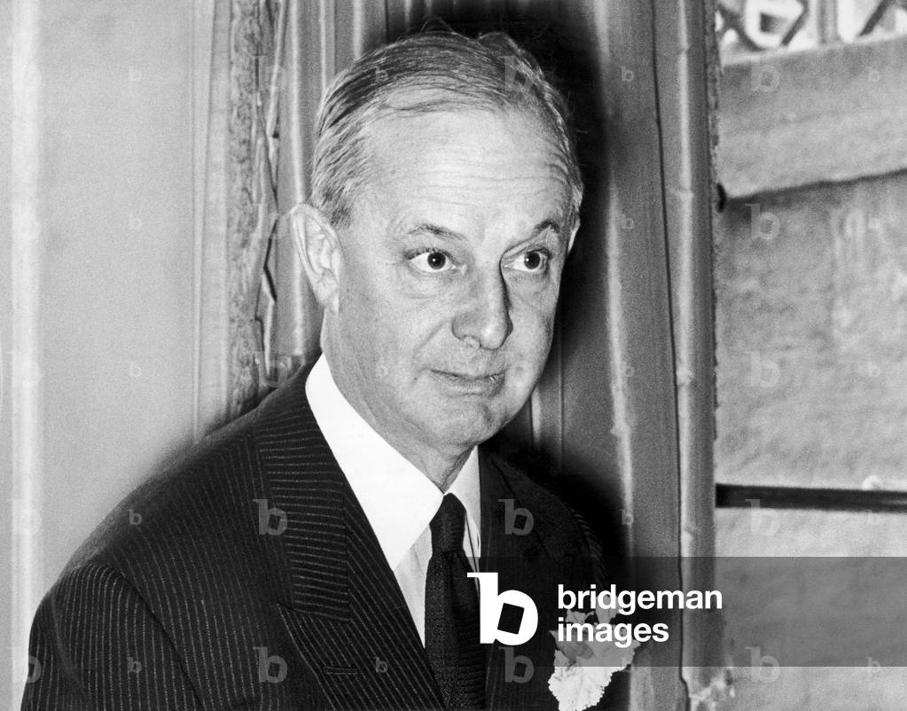 William Waldorf Astor III, 4th Viscount Astor (born December 27, 1951) is a British businessman and politician who sits as an elected hereditary peer in the House of Lords. (Picture) Lord Astor at standing conference of British Organisations for aid to Refugees held at Lord Astor's home, c. 1962 (b/w photo)