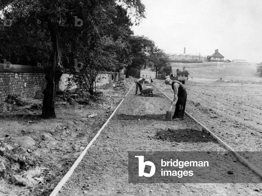Reconstruction work in progress at Wavertree Park, Liverpool, which runs between Edge Lane and Picton Road, Merseyside. 19th June 1960 (b/w photo)