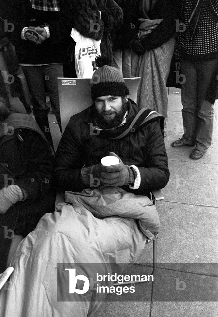 Elton John fans spent the night in sub-zero temperatures to make sure of getting tickets for the superstars concerts at Newcastle City Hall. 40 campers had taken their places on the steps in advances of Elton's March 22nd and 23rd gigs. 2nd February, 1979 (b/w photo)