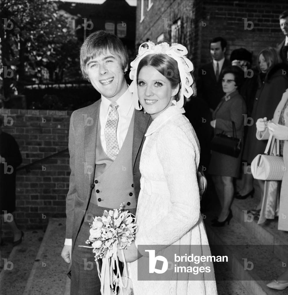 Mike Yarwood, 27, the impressionist and comedian married Sandra Burville aged 23, at the Church of St. Thomas Moore, Swiss Cottage, London. 
November 1969
